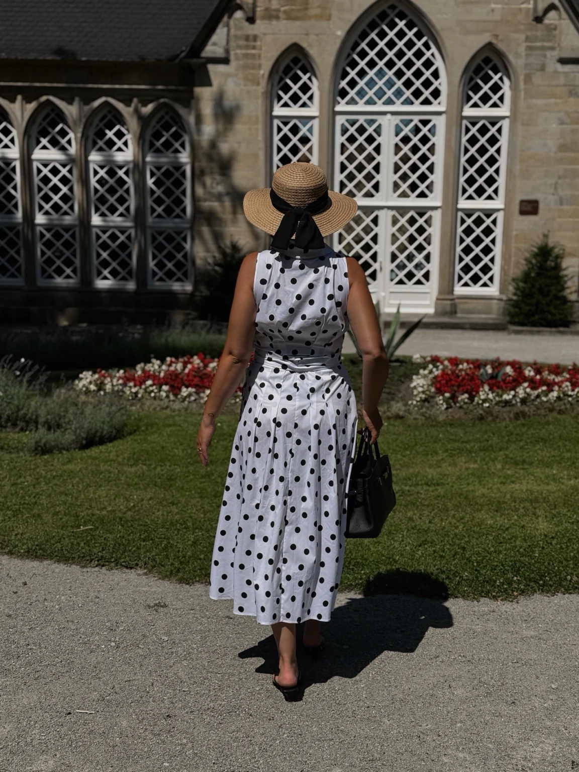 Lara outside a historic building