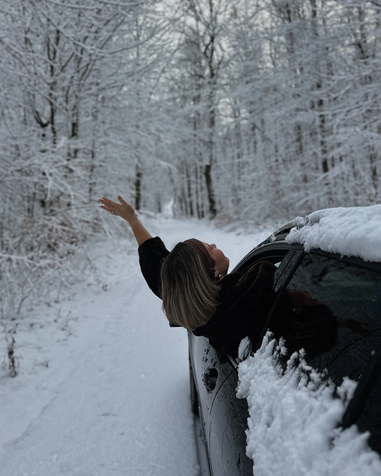 Lara in a snow-covered forest